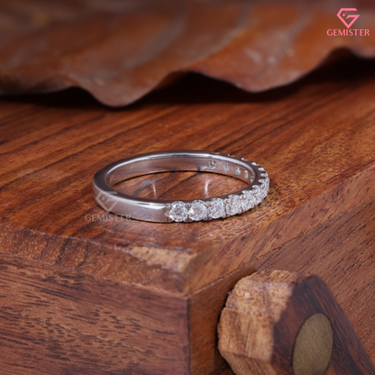 Round Moissanite Shared Prong Half Eternity Wedding Band in 14K Gold