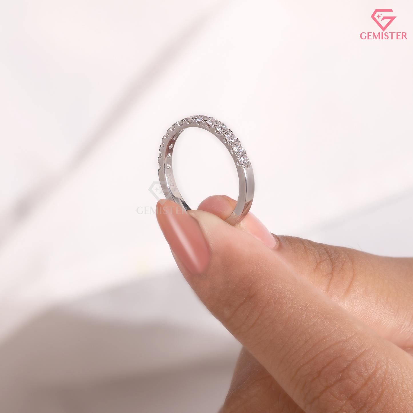 Round Moissanite Shared Prong Half Eternity Wedding Band in 14K Gold